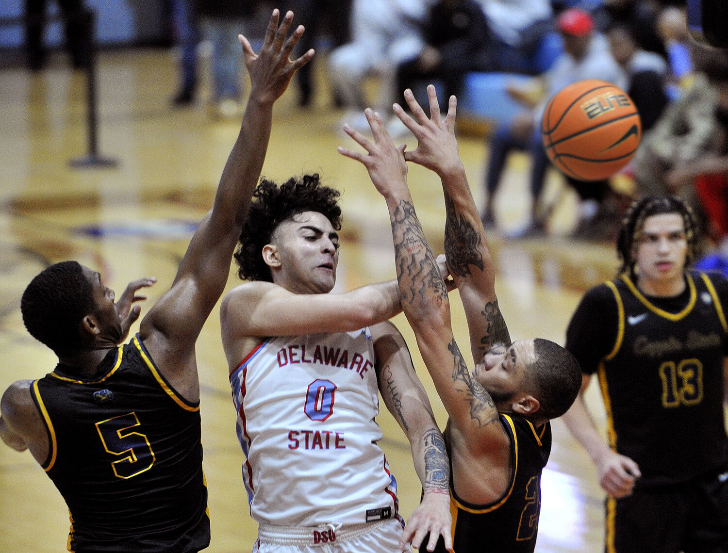 College Basketball: Delaware State Men Win MEAC Opener; Delaware Rally ...